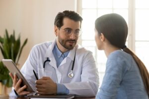 A doctor advising a patient