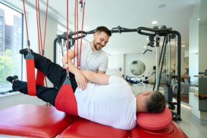 A man performing sports rehabilitation exercises